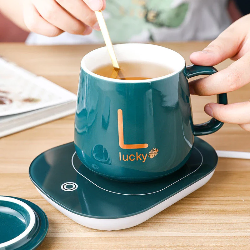 Caneca de cerâmica com aquecedor para café